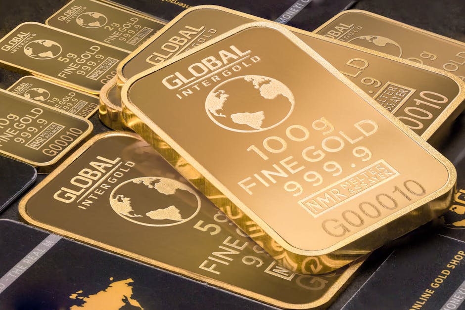 A detailed shot of gold bars labeled 'Global Intergold' as a symbol of wealth and investment